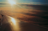 21_sun-clouds-plane-window.jpg